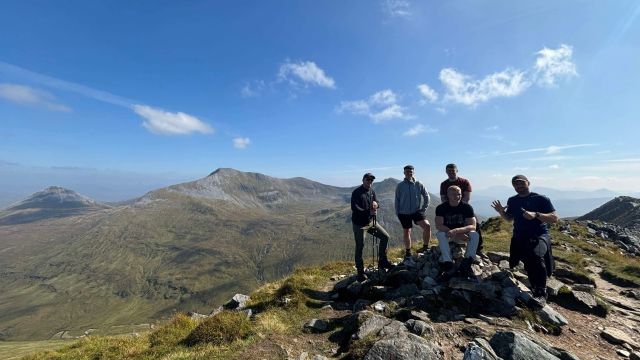 George making the most of Scotland’s landscapes on a hillwalk with friends.